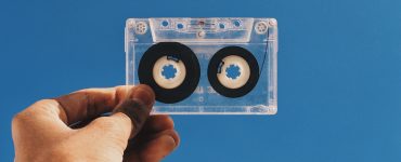 Hand holding cassette tape
