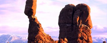 Rocky landscape with a large balanced rock called "Balanced Rock".