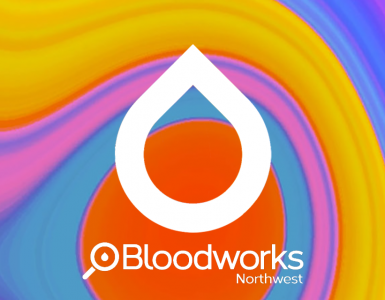 A rainbow-colored swirly background with white outline of a raindrop. Inside the raindrop is a QR code, linking, to bloodworksnw.org
