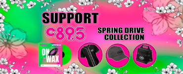 a graphic image of a grey baseball cap, black baseball jersey, canvas camping cooler, and vinyl record entitled "c89.5 on Wax". On the left are the words "Support c89.5". on the right the words "Spring Drive Collection"