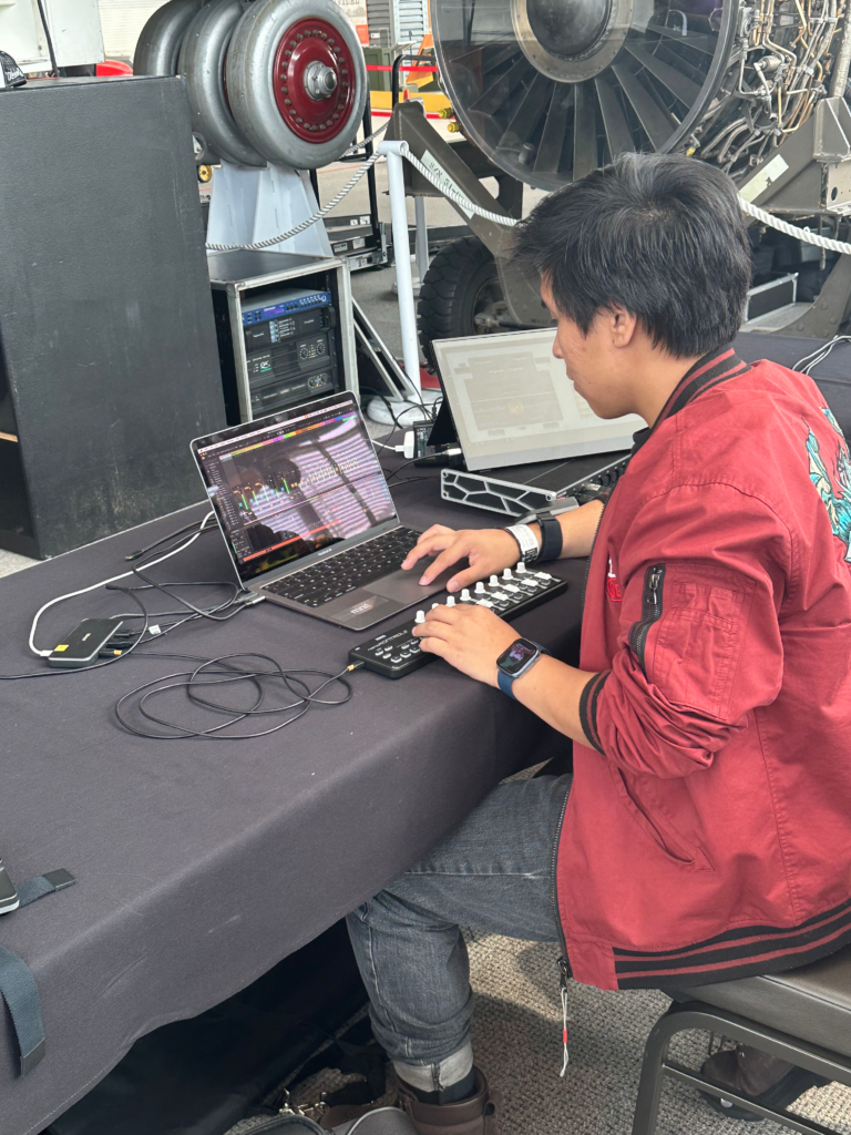 A man sitting behind a computer