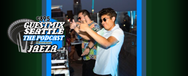 Promotional image featuring two individuals engaging in playful activities on a roofto The background shows a city skyline during twilight. Text overlay includes "c895" at the top left, and "Guestmix Seattle The Podcast Featuring Jaeza" along the bottom. The overall mood is lively and cheerful.