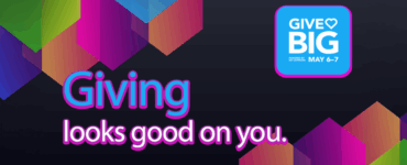Promotional banner for "Give Big" event by c895, scheduled for May 6-7. Features the phrase "Giving looks good on you" in stylized text, with vibrant, multi-colored geometric shapes in the background.