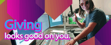 A graphic image with the words "Giving looks good on you" and a photo of a young man wearing sunglasses and giving the thumbs up sign. He is standing in front of a radio mixing board and a microphone.