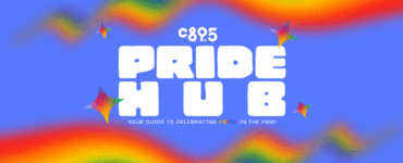 Colorful banner for C895 Pride Hub featuring rainbow swirls and star decorations, with the text 'Your guide to celebrating Pride in the PNW!'