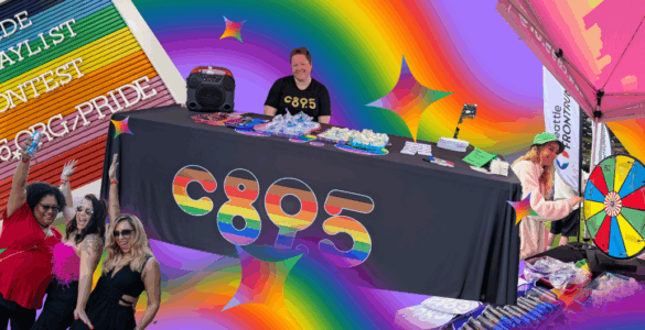 Promotional event for C895 at a Pride celebration, featuring a DJ booth, attendees spinning a prize wheel, and colorful decorations including rainbow motifs.