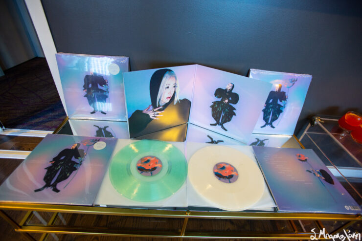 Vinyl records and album covers featuring TOKiMONSTA displayed on a shelf.