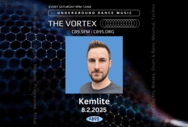 Promotional banner for "The Vortex" on C89.5FM featuring a person with short hair, a beard, and a light blue shirt. The event focuses on underground dance music and takes place every Saturday night. The date displayed is August 2, 2025, and the person is identified as Kemlite. The background features a dark, honeycomb pattern overlaid with blue digital effects.