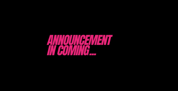 Black background with "Announcement in coming..." in bright pink