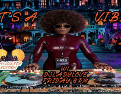Promotional image for a Halloween-themed DJ event featuring DJ Lady Love, set against a spooky background with pumpkins, ghosts, and haunted houses. The DJ is at a turntable setup, wearing sunglasses and a shiny burgundy outfit.