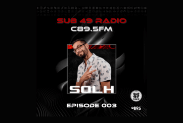 Promotional image for SUB 49 Radio on C89.5 FM featuring DJ SOLH, with episode number 003 displayed. The backdrop is dark with dynamic geometric patterns. DJ SOLH is smiling and posing confidently in a patterned shirt.