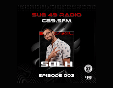 Promotional image for SUB 49 Radio on C89.5 FM featuring DJ SOLH, with episode number 003 displayed. The backdrop is dark with dynamic geometric patterns. DJ SOLH is smiling and posing confidently in a patterned shirt.