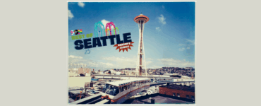 Aerial view of Seattle featuring the iconic Space Needle under a clear sky, with colorful text and graphics saying "Best of Seattle" in the upper left corner.