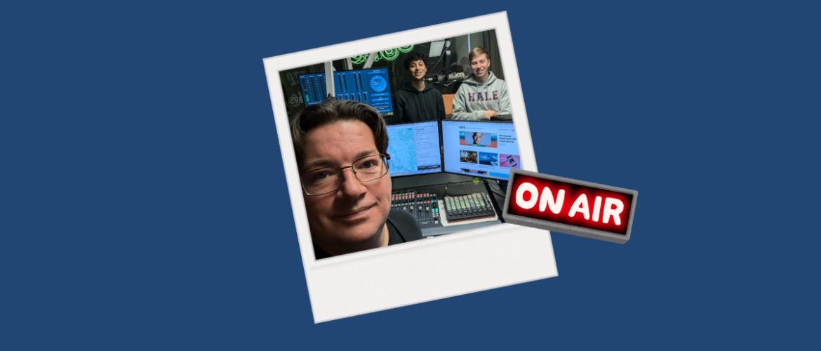 A polaroid photo of Drew Bailey and two students on air in the c895 studios