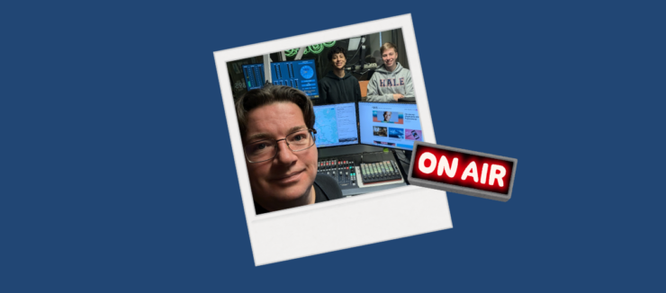 A polaroid photo of Drew Bailey and two students on air in the c895 studios