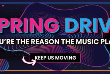 Colorful graphic with the text "Spring Drive" in bold letters. Below, it reads "You're the reason the music plays." A button labeled "Keep Us Moving" is highlighted with an arrow. The background features abstract shapes and vibrant colors.