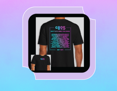A person wearing a black C89.5 T-shirt. The front logo reads "C89.5" in bright colors. The back features the same logo at the top, with a list of radio shows and program names in colorful text. The background is a vibrant rainbow gradient pattern.