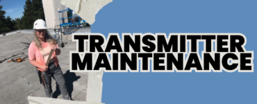 A person stands on a rooftop with safety gear and tools, wearing a white helmet and holding equipment. Large text reads: "TRANSMITTER MAINTENANCE" on a blue background. Torn paper edges frame the image.