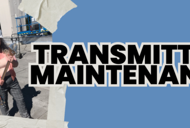 A person stands on a rooftop with safety gear and tools, wearing a white helmet and holding equipment. Large text reads: "TRANSMITTER MAINTENANCE" on a blue background. Torn paper edges frame the image.