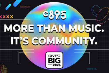 A colorful graphic with the text "C89.5 More Than Music. It's Community." The background features abstract shapes and a rainbow gradient circle. At the bottom, a square logo reads "Give Big 2026.
