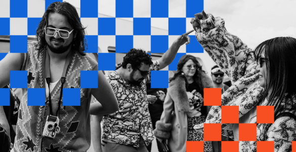 A group of people enjoy dancing with lively expressions. A person in the foreground wears large glasses and a camera around their neck. The image has a checkerboard overlay pattern in blue and orange squares.